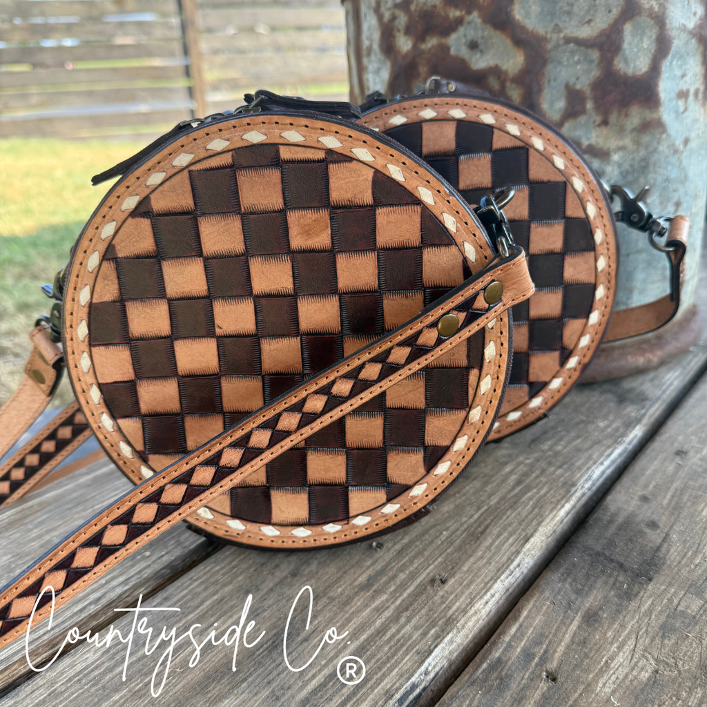This Tribeca Leather Checkered Canteen Purse Trendy