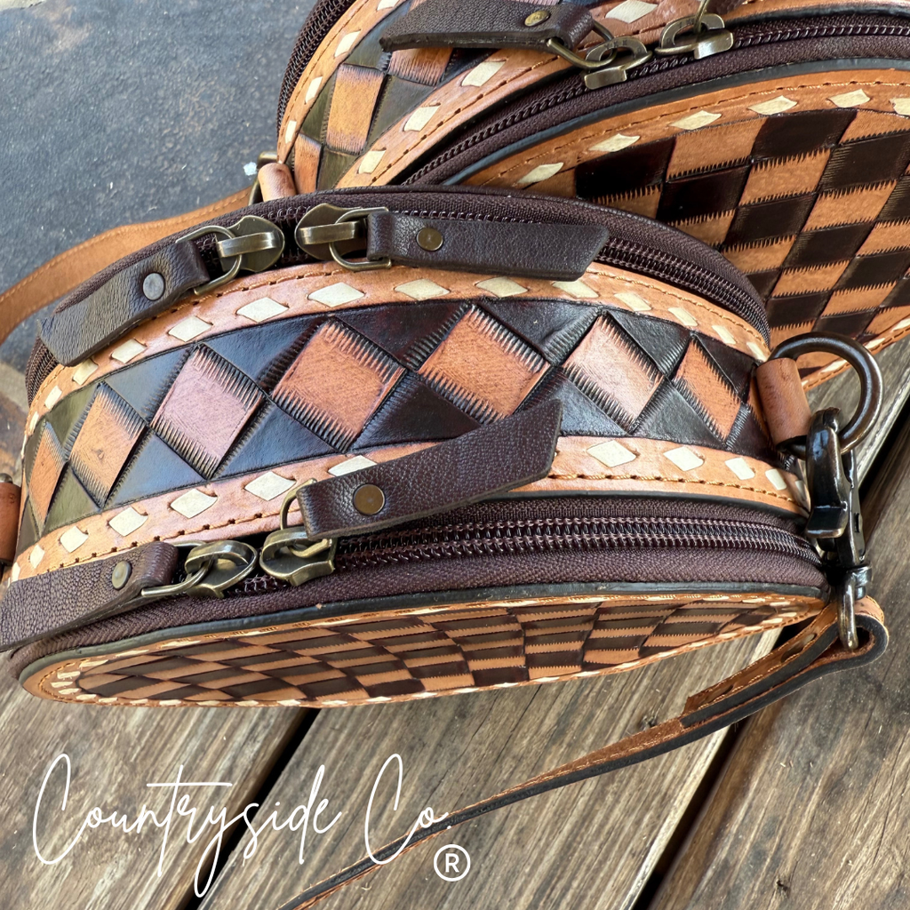 This Tribeca Leather Checkered Canteen Purse Trendy