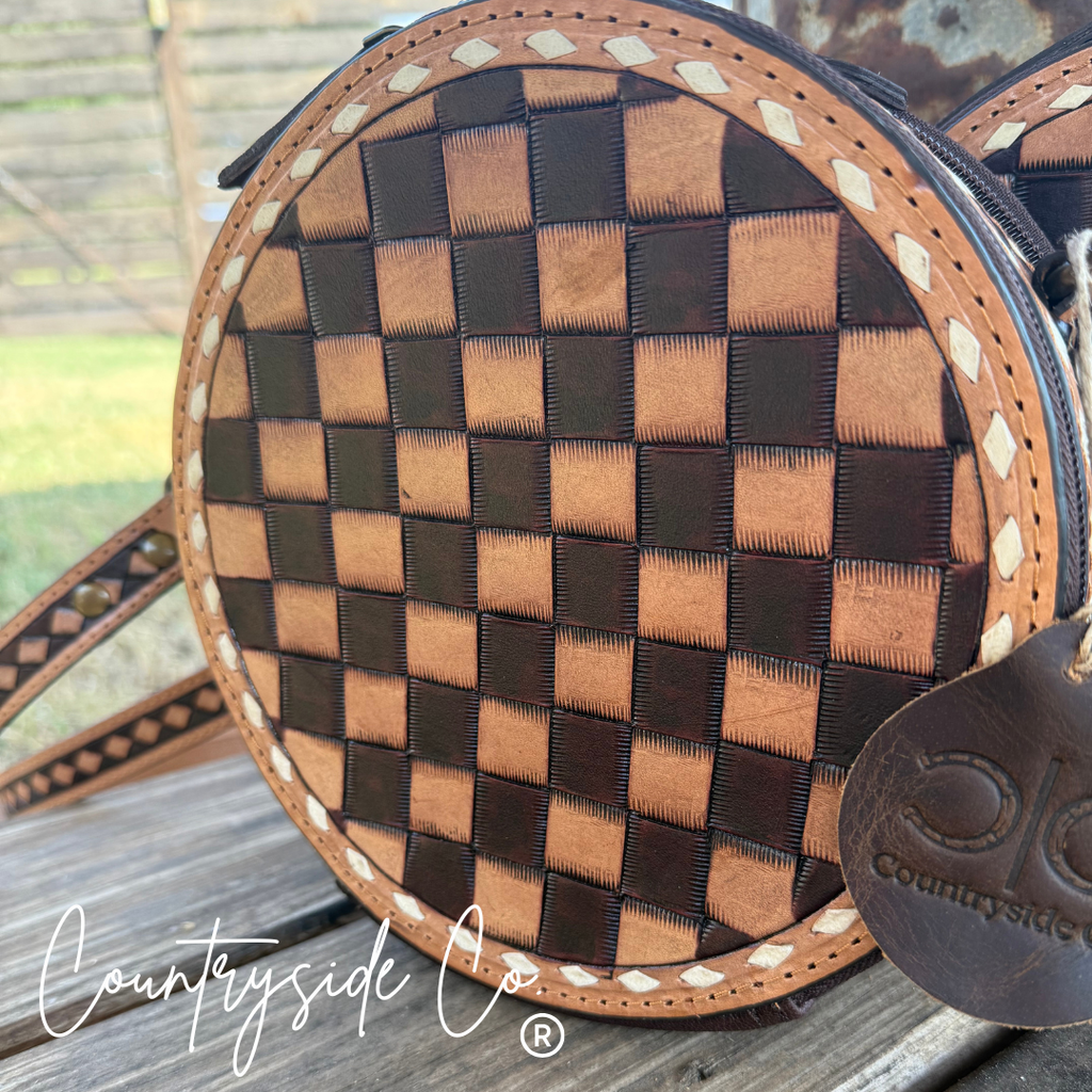 This Tribeca Leather Checkered Canteen Purse Trendy