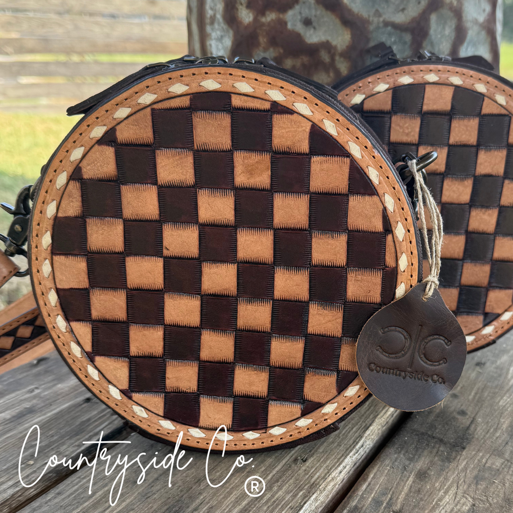 This Tribeca Leather Checkered Canteen Purse Trendy