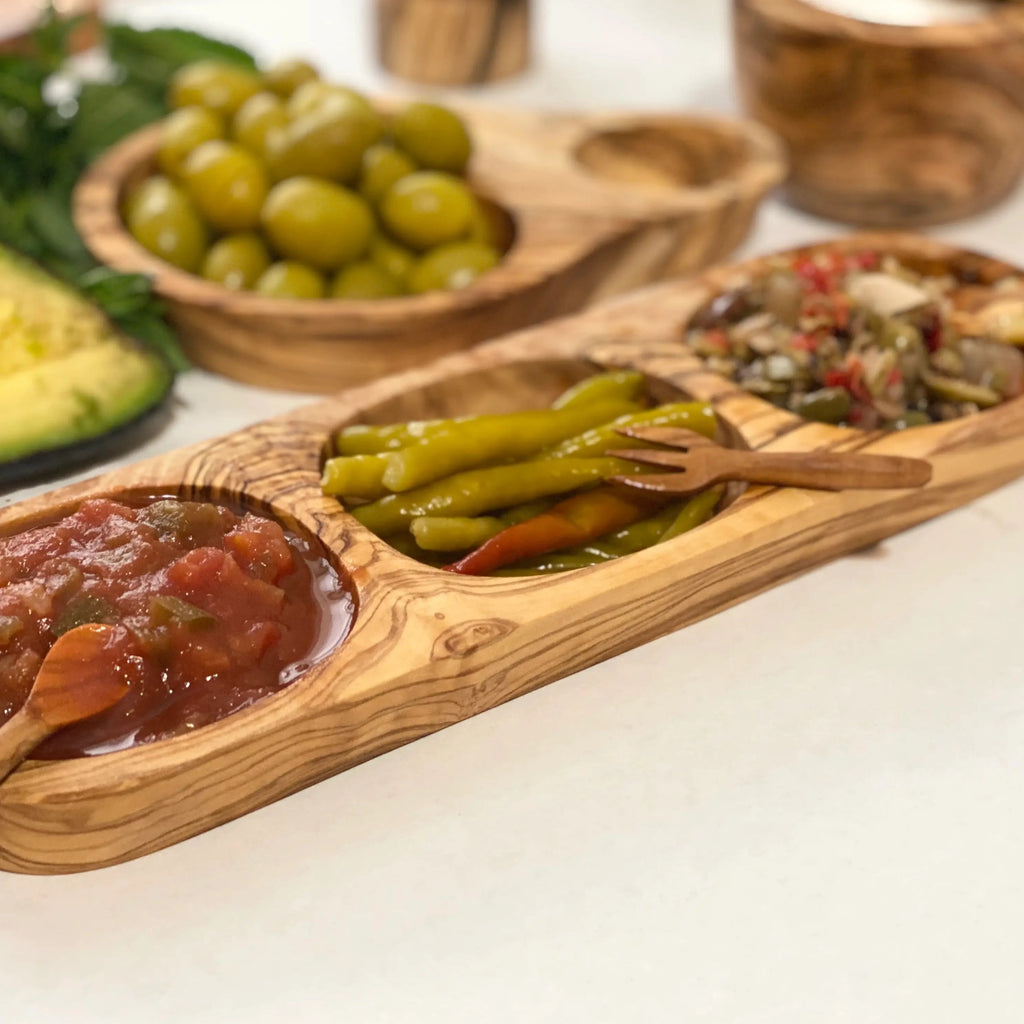 Image of an olive wood tray with three sections for food.