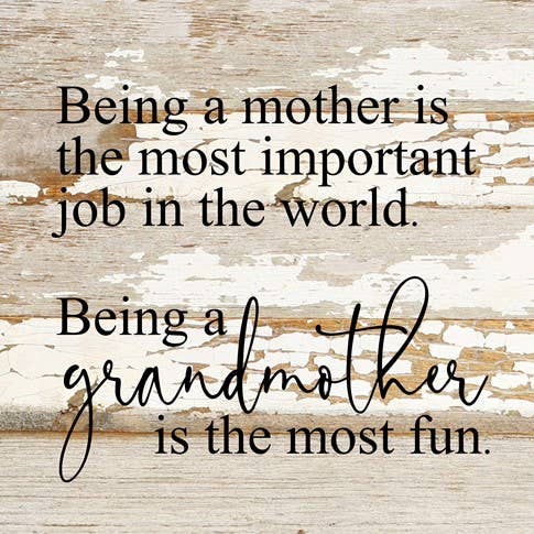 Image shows a natural wood sign. Text reads "Being a mother is the most important job in the world. Being a grandmother is the most fun."