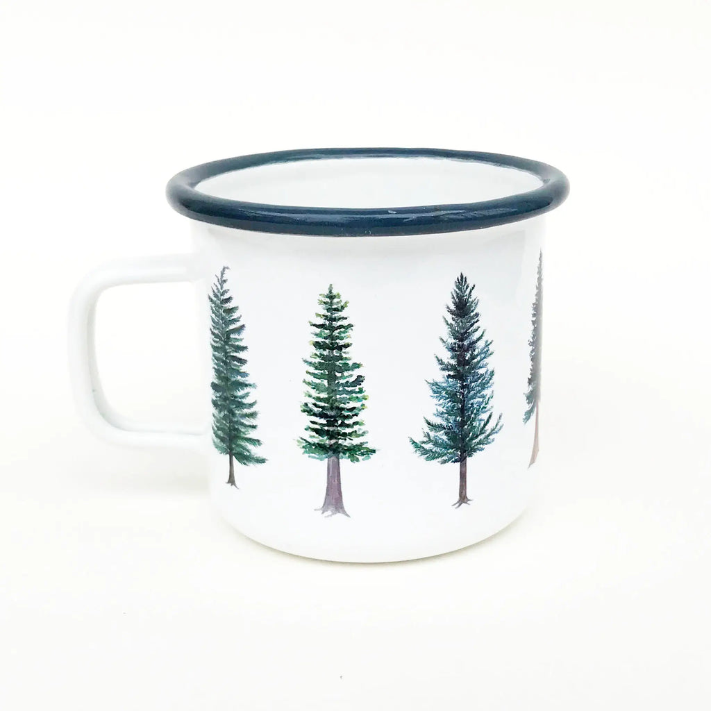 Image of a white camp mug with a blue lip and painted and labeled evergreens along the outside.