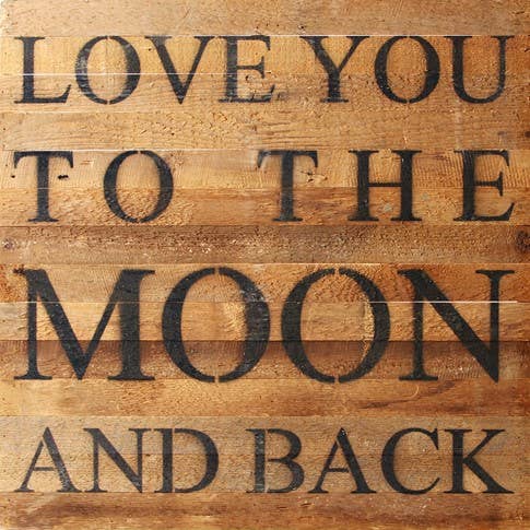 Image shows a natural wood sign. Text reads "Love you to the moon and back"