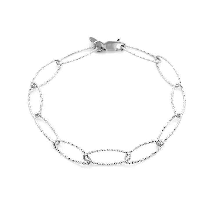Image shows a silver bracelet on a white background. Bracelet links have intricate fine bevelling on the links
